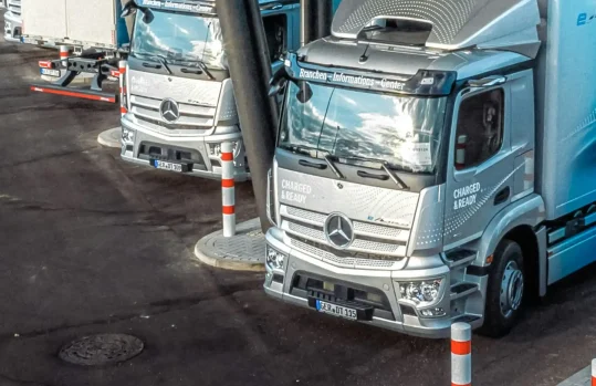 electric truck at charging station