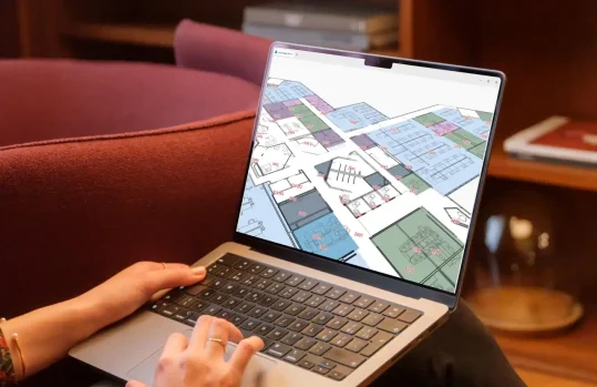 user viewing urban plans on a laptop