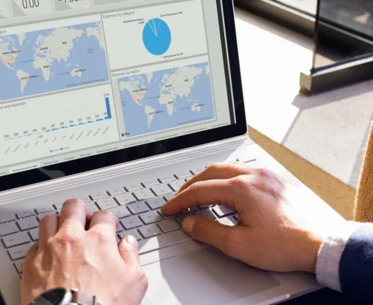 a user reviewing a CRM dashboard showing sales data on a map