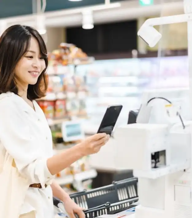 a person making a purchase with a mobile phone